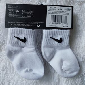 Nike Infant White Socks with Black Swoosh